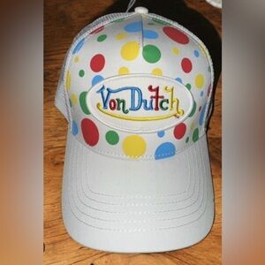 Von Dutch white polka dot trucker hat with an embroidered logo patch.